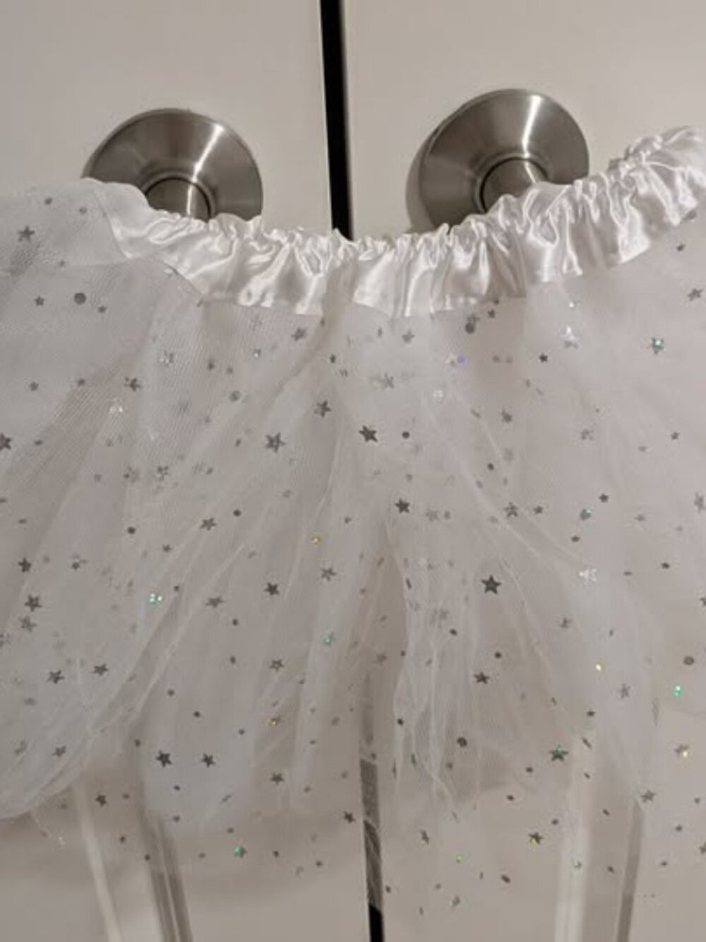 Small, sparkly white tulle skirt
